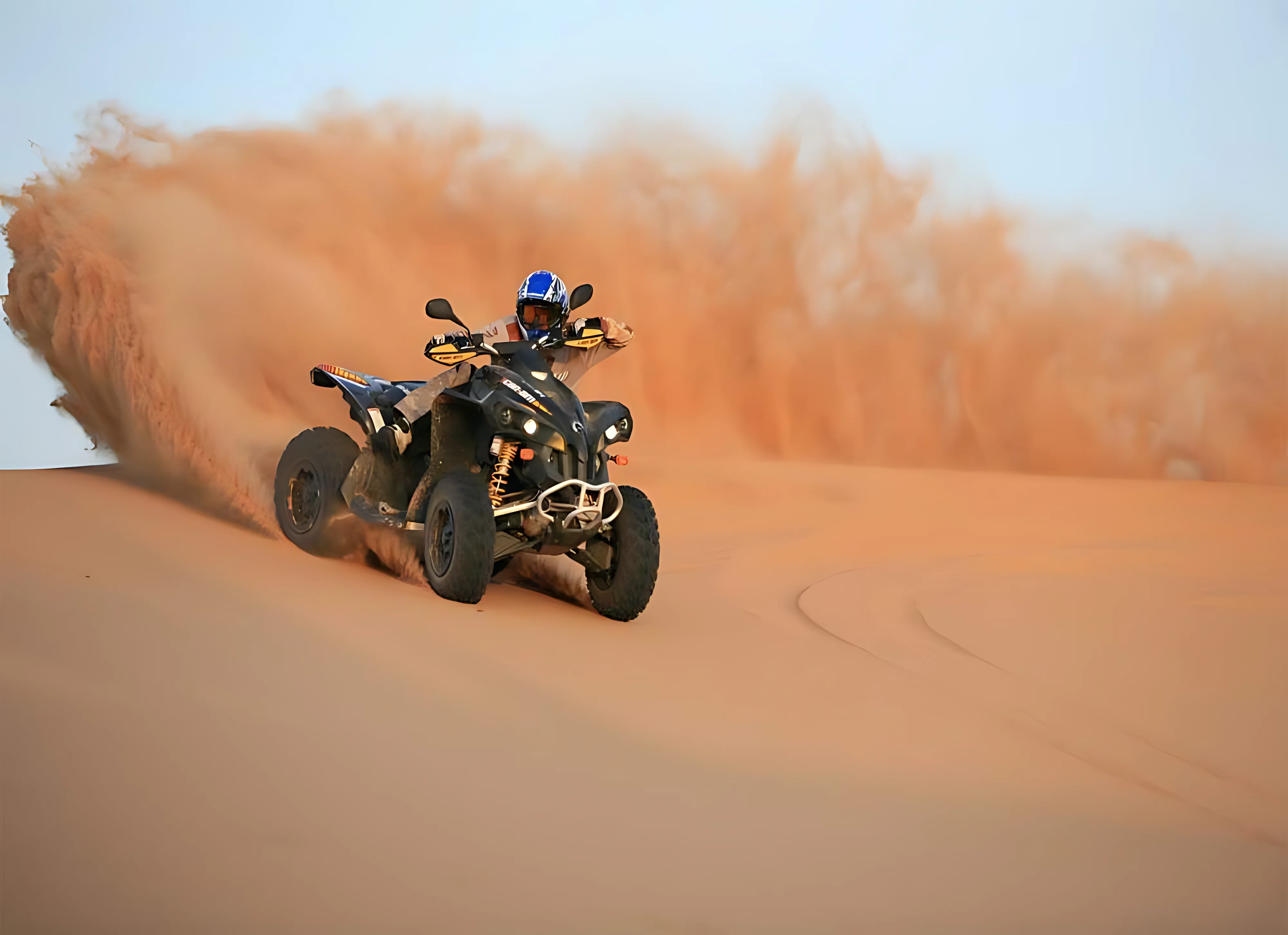 Quad biking adventure across the sand dunes during a Dubai desert safari